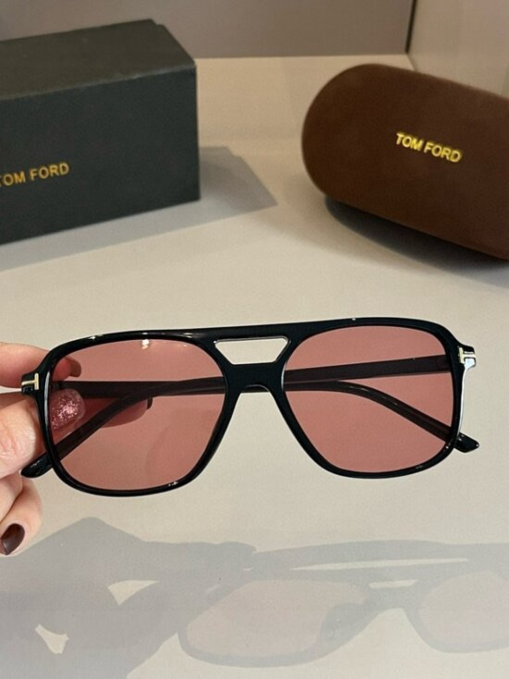 Tom Ford Black Frame Sunglasses with Rose-Tinted Lenses